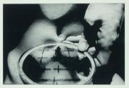 [Hand with mirror]
