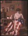 [Woman making American Flag]