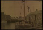 [Two men on the boat "Inez"]