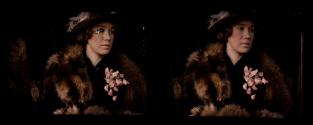 [Woman wearing fur stole and corsage]