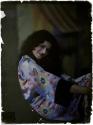 [Woman in floral silk robe]