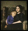 [Rose Silberstein and son George, in London home]