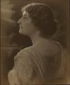 [Young woman, head and shoulders profile from back]