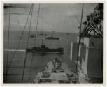 View of the LCI's 438,474,450 moving in to fire their rockets at close range on island.