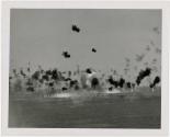 Japanese Kate splashing after being stopped by ack ack of BB35 during suicide run on ship off Le Shima