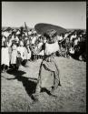 A ritual dance in Livingstone, Northern Rhodesia, features costumes and masks borrowed, mostly, from the Museum there.