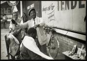 Johannesburg barbers take pride in their profession.  Although some customers prefer the economical clipping to the skin, the crew cut seems most popular.