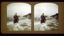 [Will Connell on motorcycle, heading up highway, California]