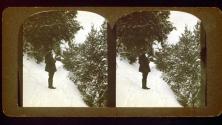 [Will Connell on snow-covered path in woods]