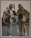 Ens J. W. Bartal AV(n) photographic pilot of VF-16 and Air group Commander E. N. Snowden VSN