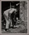 LITTLE FRENCH GIRL EMERGES FROM HER HOVEL