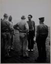 CAPTAIN OF BLASTED SUB CHATS WITH CARRIER OFFICERS