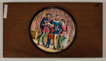 [young man gives cat to family]