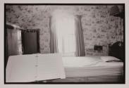 [Bedroom with sheet music stand]