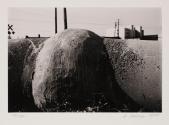 [Cityscape with drainage pipe]