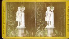 [Statue of small girl and floral vase]