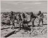 Carrying wounded on a stretcher