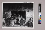 Natives of Iheya Shima are quietly gathered into a compound at the beachhead when the island was invaded.
