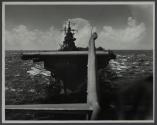 [Aircraft carrier viewed from plane during takeoff]