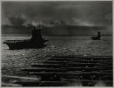 [Biplanes and aircraft carriers at sea]