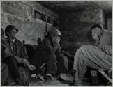 [Men waiting and sleeping]