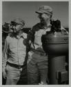 [Two men, probably senior officers, on a ship]