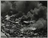 [Aerial view of village fire]