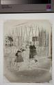 [Two Girls by Porch]