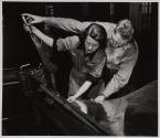[Man and woman at work]