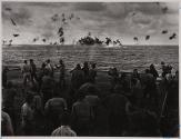 [Deck crew on aircraft carrier cheering the downing of an enemy plane]