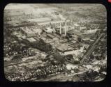 Aerial view of Kodak Park, 230 acres in extent with a manufacturing fl oor space of 80 acres and and output in motion picture film of 150,000 miles per year.