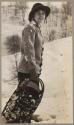 Kodak Girl model Mabel Allen Ackermann holding snowshoes