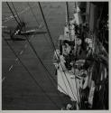 [Crew on aircraft carrier island]