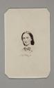 [Woman wearing a bow around her neck]