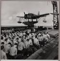 [Crew convened on deck, probably for religious or memorial service]