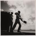 [Signalman on flight deck]