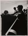 [Military personnel on island of aircraft carrier at sea]