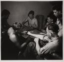 [Servicemen playing cards and smoking]