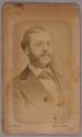[Man with moustache and sideburns]