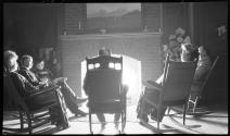 People sitting in front of fire place, Oak Lodge Trip