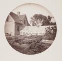 [View of gardens and greenhouse]