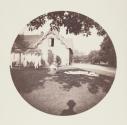 [Clothes on line and spread out on lawn in side yard]