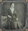 [Young woman, seated]