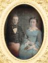[Couple (woman in blue dress)]
