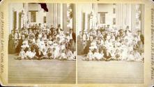 [Large group of men, women, and children]