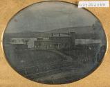 [Large building facing a lake]