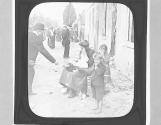 ZW. Belgian woman & children begging.