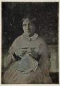 [Woman sewing]