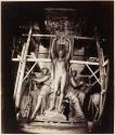 [Sculptor Amié Millet with "Apollo Crowning Dance and Poetry," Full-scale plaster model for bronze statue mounted on the Paris Opera's Flytower Apex.]