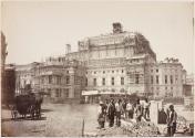 [Workers in front of Paris Opera under construction]